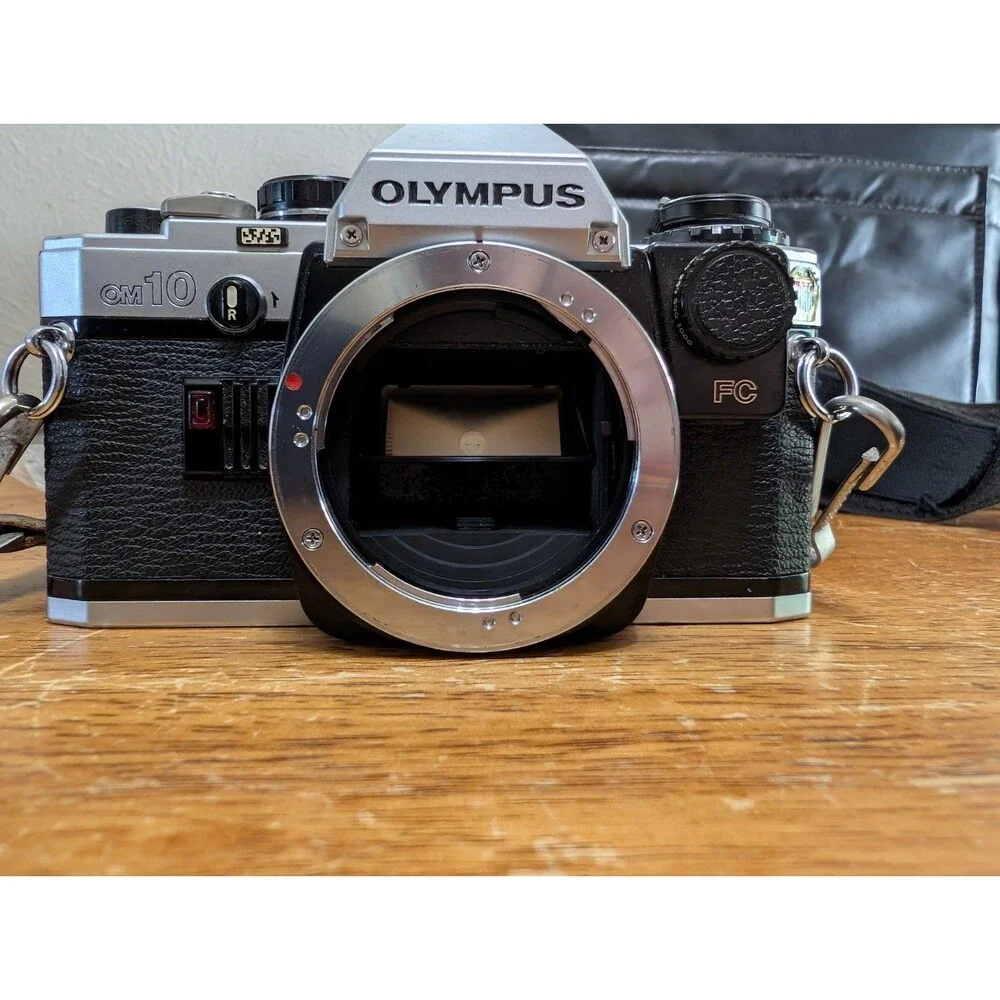 Vintage Olympus OM-10 Film Camera & 3-Lens Kit Bundle with Disney EPCOT Strap